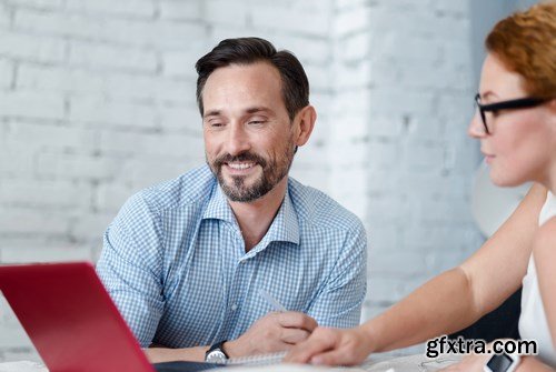 Woman and Man - Working with Laptop & Taking Notes 2 - 25xUHQ JPEG Photo Stock