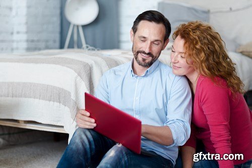 Woman and Man - Working with Laptop & Taking Notes 2 - 25xUHQ JPEG Photo Stock