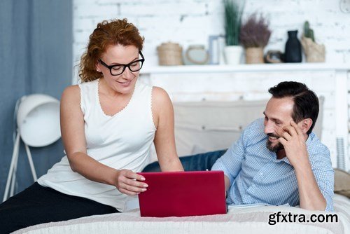 Woman and Man - Working with Laptop & Taking Notes 2 - 25xUHQ JPEG Photo Stock