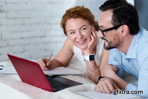 Woman and Man - Working with Laptop & Taking Notes 2 - 25xUHQ JPEG Photo Stock