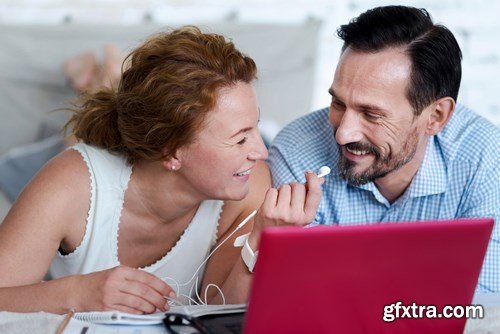 Woman and Man - Working with Laptop & Taking Notes 2 - 25xUHQ JPEG Photo Stock