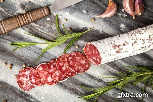 Salami on dark background - 20xUHQ JPEG Photo Stock