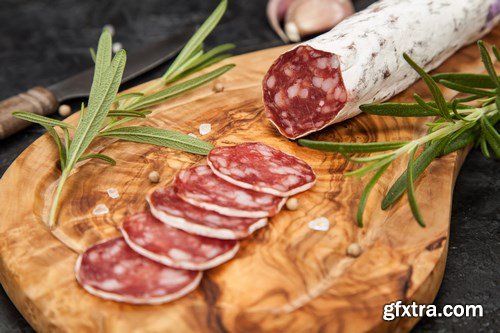 Salami on dark background - 20xUHQ JPEG Photo Stock