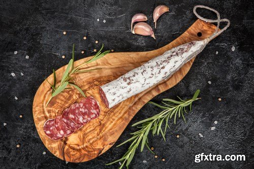 Salami on dark background - 20xUHQ JPEG Photo Stock