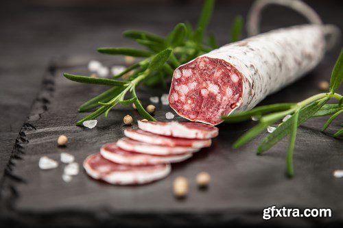 Salami on dark background - 20xUHQ JPEG Photo Stock