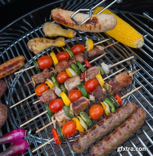 Assorted delicious grilled meat with vegetable on a barbecue - 18xUHQ JPEG Photo Stock