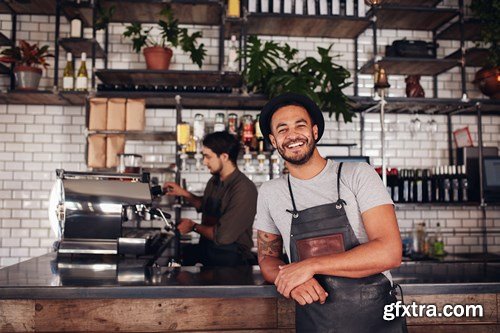 Cafe owner standing at the counter - 10xUHQ JPEG Photo Stock