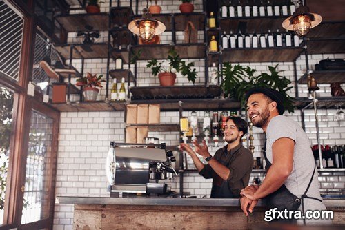 Cafe owner standing at the counter - 10xUHQ JPEG Photo Stock