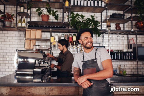 Cafe owner standing at the counter - 10xUHQ JPEG Photo Stock