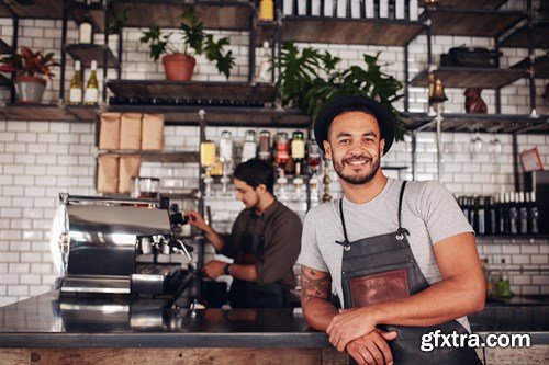 Cafe owner standing at the counter - 10xUHQ JPEG Photo Stock