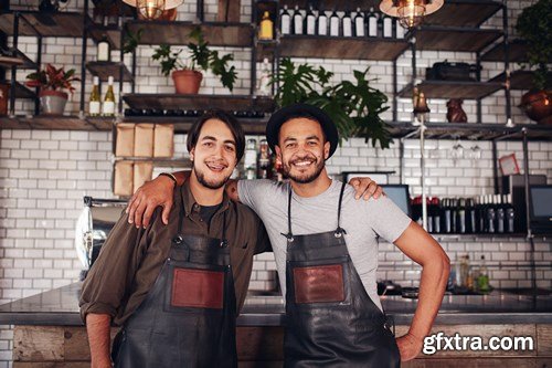 Cafe owner standing at the counter - 10xUHQ JPEG Photo Stock