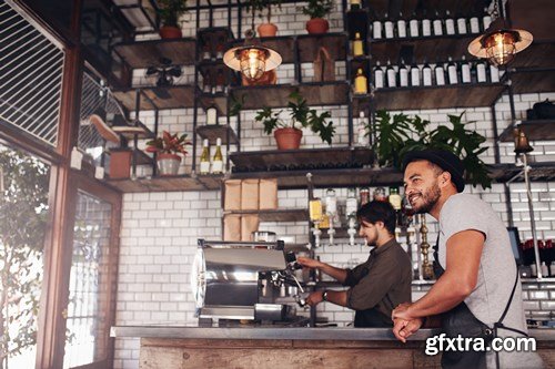 Cafe owner standing at the counter - 10xUHQ JPEG Photo Stock