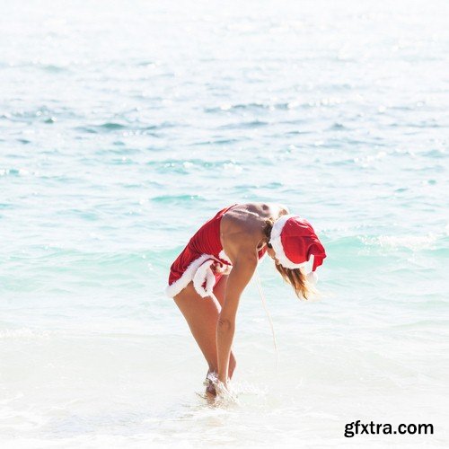 Santa Claus girl on the beach - 8 UHQ JPEG