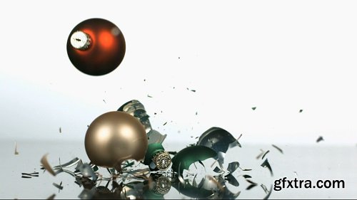 Slow motion dropping and smashing christmas ornaments