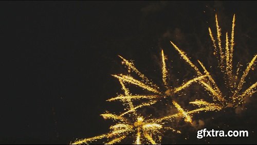 Yellow fireworks exploding