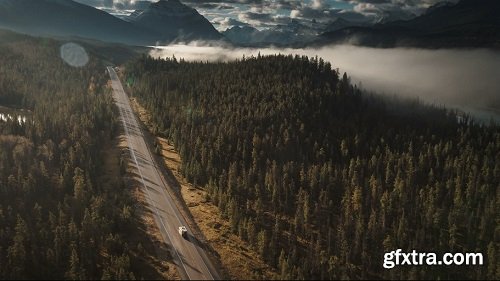 Aerial of rv driving on icefields parkway in jasper birds eye