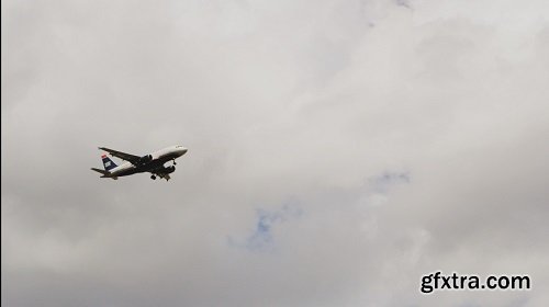 Airplane flying in clear blue sky