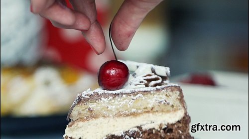 Decorating tasty cake with cheery super slow motion shot at 240fps