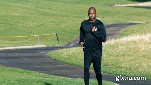 Black man running on a trail in slow motion 2