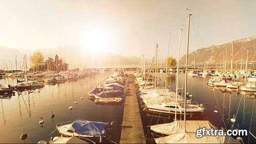 Magic hour sunset aerial viewwater lakesailboats dock pierpanorama horizon