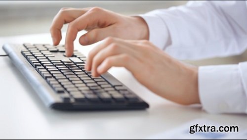 Male doctor hands typing on keyboard