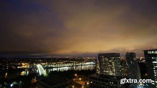 Sunrise breaking over city time lapse