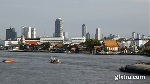 Time lapse nautical vessels along the chao phraya river passing bangkoks