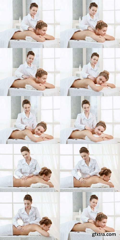Girl massage therapist doing head massage beautiful brunette girl