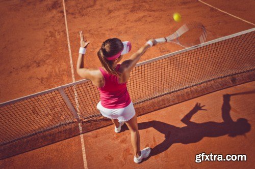 Young woman playing tennis 10X JPEG