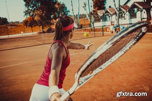 Young woman playing tennis 10X JPEG