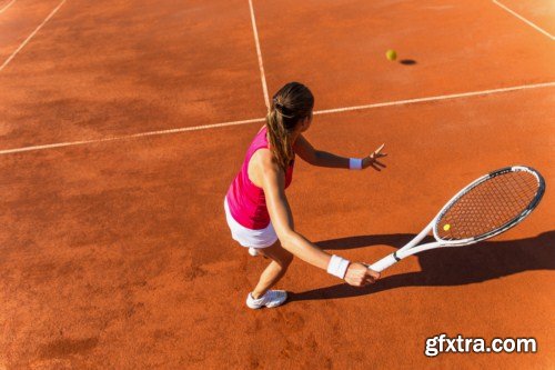 Young woman playing tennis 10X JPEG