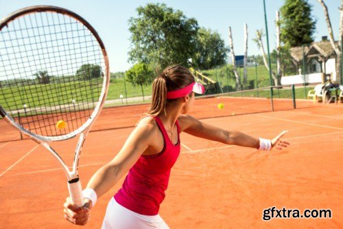 Young woman playing tennis 10X JPEG