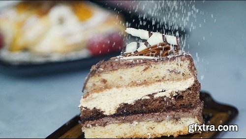 Sprinkle powder sugar on tasty cake super slow motion shot at 240fps