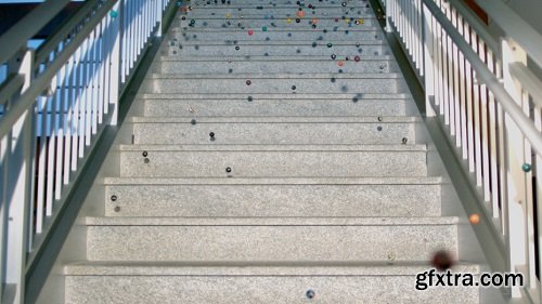 Slow motion bouncy balls on marble steps