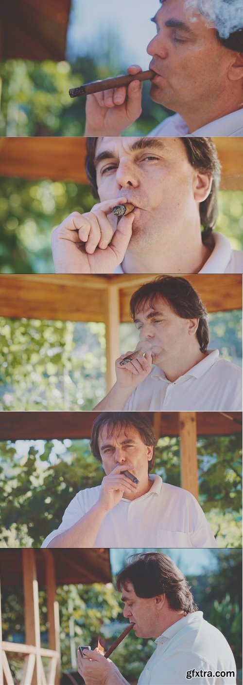 Adult man is smoking cigar