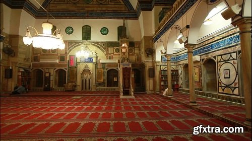 interior shot of mosque with people engaged in prayer 2