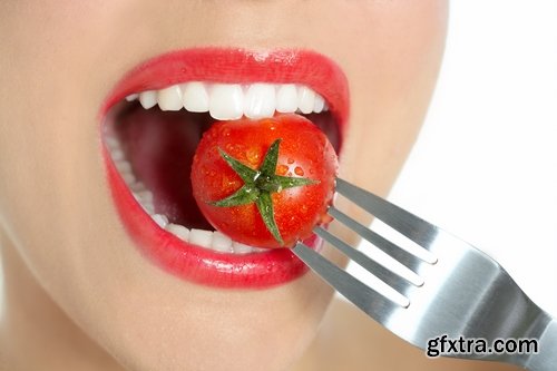 Woman eating tomato slimming vegetable 25 HQ Jpeg