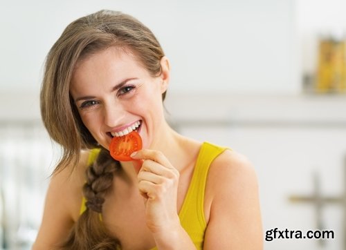 Woman eating tomato slimming vegetable 25 HQ Jpeg