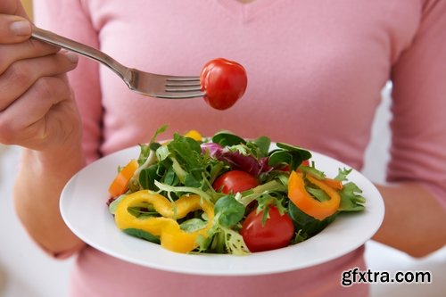 Woman eating tomato slimming vegetable 25 HQ Jpeg