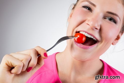 Woman eating tomato slimming vegetable 25 HQ Jpeg