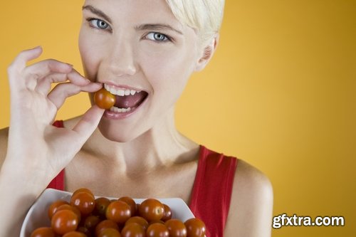 Woman eating tomato slimming vegetable 25 HQ Jpeg