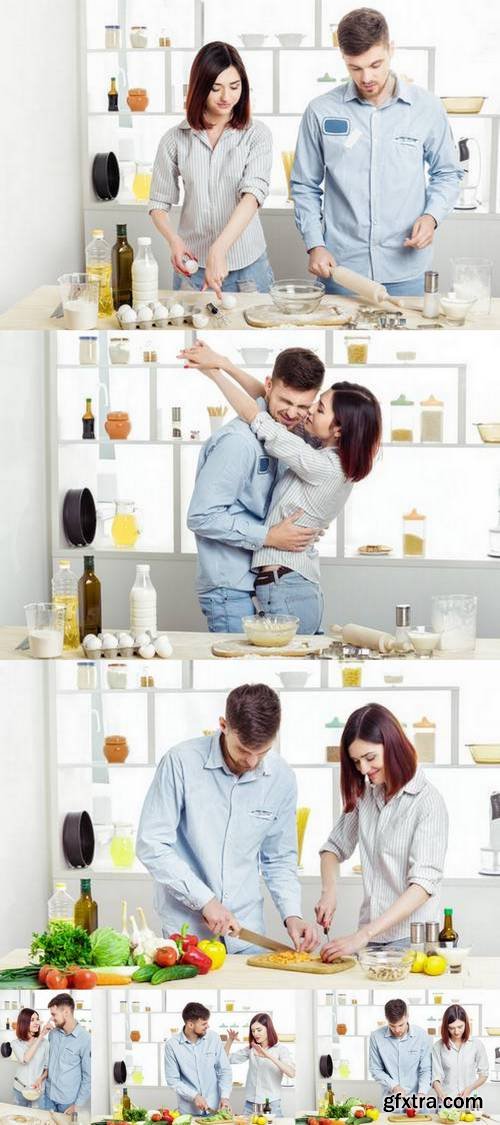 Loving Happy Couple Preparing Healthy Salad of Fresh Vegetables in Kitchen