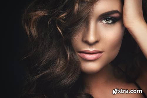 Woman with curly Hair and Beautiful Make-up