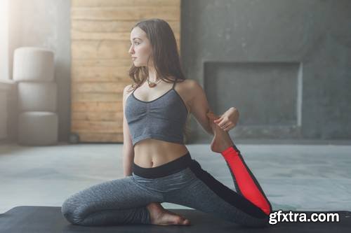 Young Attractive Woman Practicing Yoga