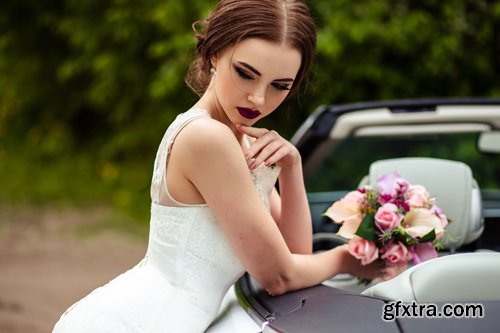 Beautiful bride and groom near the wedding car