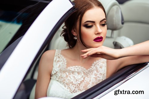 Beautiful bride and groom near the wedding car