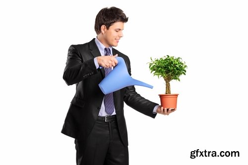 man watering a plant gardening sprout a germ 25 HQ Jpeg