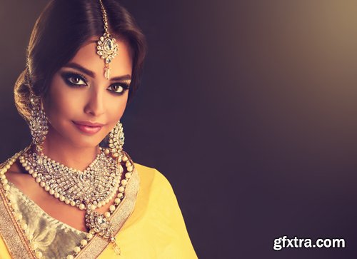 Beautiful Indian girls in traditional clothes, beautiful make-up, women with beautiful jewelry