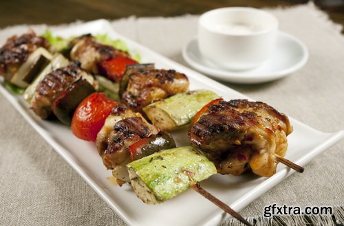 Shish Kebab on Skewers and Grilled Meat with Vegetables 25xJPG