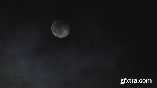 Clouds Pass By The Full Moon